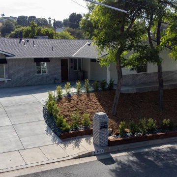Wide Front Yard Driveway and Landscaping