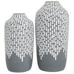 The Novogratz - Modern Gray Ceramic Vase Set 561297 - These modern ceramic vases are perfect as a set decoration for living rooms with light-toned walls and pastel-finished table decors. Designed with felt or rubber stoppers at the base that prevent scratching furniture and table tops, as well as sliding around. This item ships in 1 carton. Suitable for indoor use only. This item ships fully assembled in one piece. This gray colored stoneware vase comes as a set of 2. Modern style. Vases have 1.50 in, and 1.50 in mouth openings.