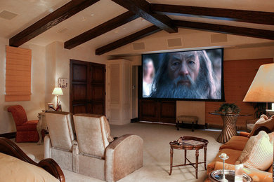 Inspiration for a huge timeless master carpeted bedroom remodel in Orange County with beige walls