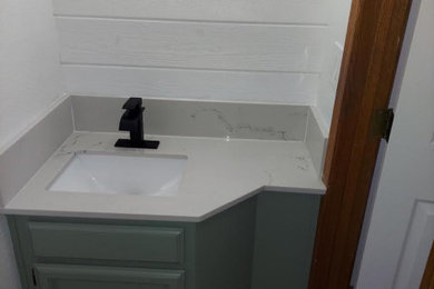 Inspiration for a powder room remodel in Other