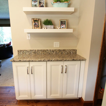 Cream Kitchen with Green Island with Butcher Block Countertop
