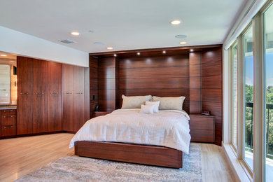Bedroom - large contemporary master light wood floor and beige floor bedroom idea in Tampa with white walls and no fireplace