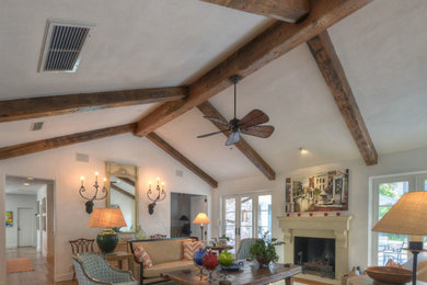 Large beach style formal and enclosed living room photo in Atlanta with white walls and a standard fireplace
