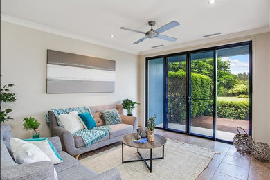 Photo of a modern living room in Gold Coast - Tweed.