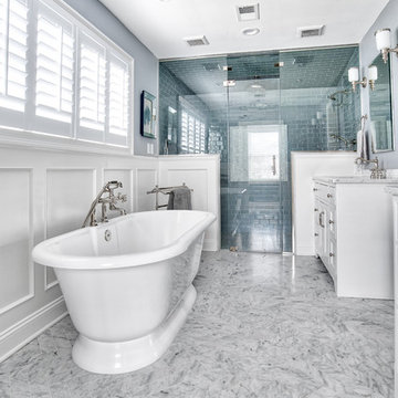 Marble Herringbone Floors with a Large Steam Shower