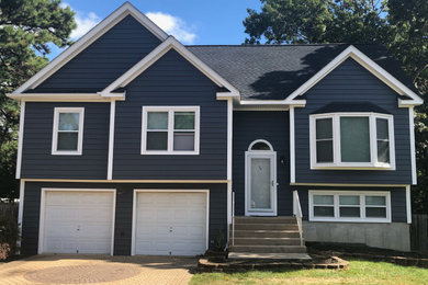 Example of an arts and crafts exterior home design in New York