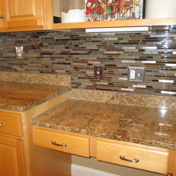 Beautiful Glass and Copper Backsplash