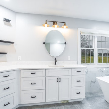Master Bathroom Remodeled With White Flooring, Bathtub, Shower, Highland MD