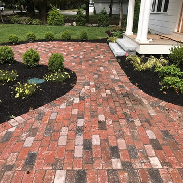 LYNNFIELD BRICK WALKWAY PATH WITH MONOLITHIC GRANITE STEPS TO PORCH
