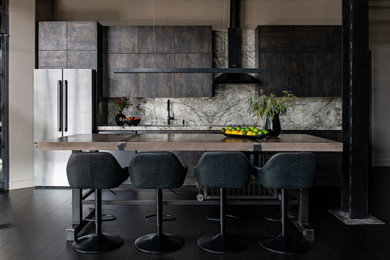 Inspiration for an industrial single-wall dark wood floor, brown floor and exposed beam kitchen remodel in Toronto with flat-panel cabinets, brown cabinets, tile countertops, porcelain backsplash, an island and brown countertops