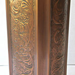 Excellent Accents Inc. - Solid Copper Umbrella Stand Embossed 20"H x 7.75"W - Embossed solid copper umbrella stand with solid cast brass trim, feet, and ring handles.   Height 20,"  Width (measured from side to side across top) 7.75"  The Antiqued Copper Finish is lacquered inside and out for tarnish resistance and easy maintenance.  This compact solid copper umbrella stand is designed to compliment your foyer where space is limited, but with all of the elegance of our larger stands.  The embossed "vines" pattern on all 4 sides and sturdy convex corners produce a rugged yet beautiful piece reflecting the hand-made traditions of our experienced copper craftsmen.   An Excellent Accents exclusive!   NOTE:   Ships to continental US only.  Cannot ship to a PO Box.  Note: Because this piece is made by hand, final dimensions or finish patina can vary slightly.