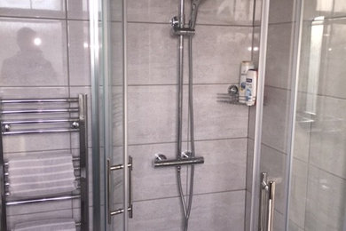 Grey tiled modern bathroom