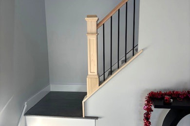 Example of a small trendy wooden straight mixed material railing staircase design in Other with wooden risers
