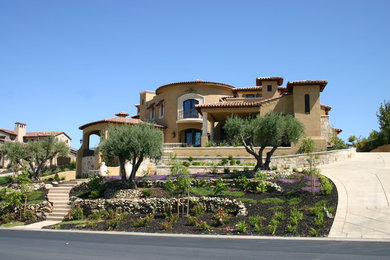 Example of a tuscan home design design in Santa Barbara