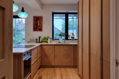 Inspiration for a modern kitchen in Sussex.