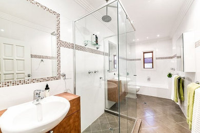 Design ideas for a modern bathroom in Brisbane with white tile and ceramic tile.