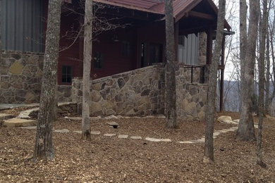 Example of a trendy home design design in Other