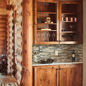 Iowa Milled Log Home Built-in Nook, A Cabin Refined™ Home