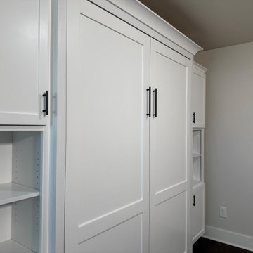 Custom Vertical Queen Murphy Bed with Side Shelving and Storage Cabinets