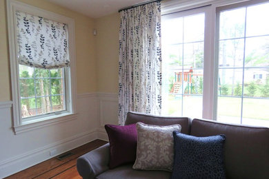 Example of a transitional family room design in New York