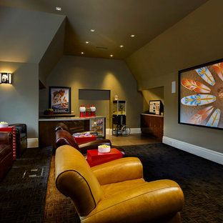 Example of a classic enclosed home theater design in Detroit with a projector screen
