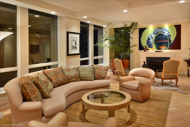 Inspiration for a mid-sized contemporary formal and open concept light wood floor and brown floor living room remodel in Chicago with beige walls, a standard fireplace, a stone fireplace and no tv