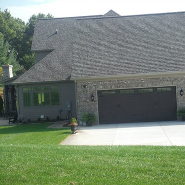 Khaki Brown Lap Siding | Pebblestone Clay Aluminum Soffit & Fascia | Ladue, MO.