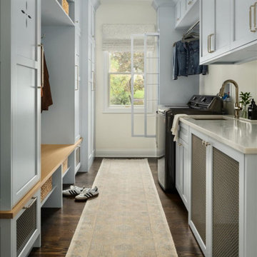 Laundry Room – Blue-Gray Cabinets and Integrated Drying Rack