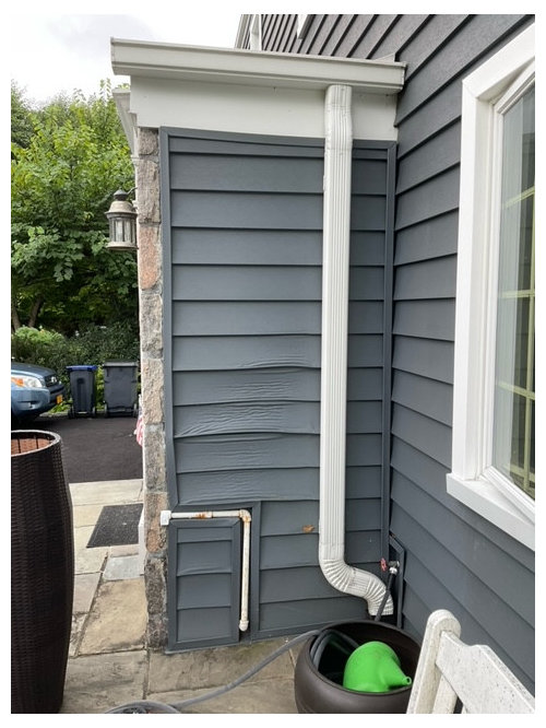 Ideas on replacing damaged vinyl siding with different material.