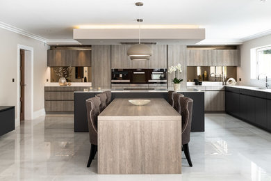 Contemporary Kitchen with a T Shape Island and Dining