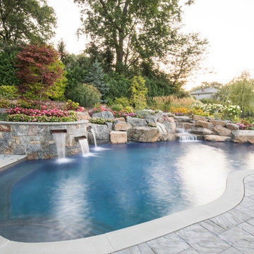 freeform oaisis with a waterfeature and waterfalls in Short Hills NJ