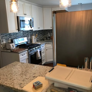 kitchen remodel--white cabinets/granite countertops/floors