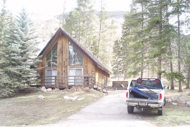 Inspiration for a rustic home design remodel in Denver