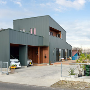 他の地域のインダストリアルスタイルのおしゃれな家の外観 (緑の外壁、戸建) の写真