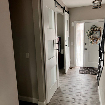 New sliding doors 2026 - Sete 6933 White Silk, double barn doors with black hand