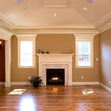 White wood surround & mantle for fireplace