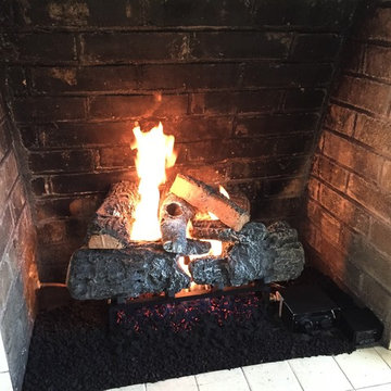 Vented gas logs