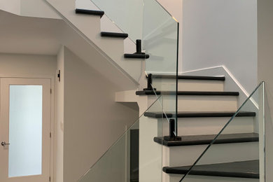 Inspiration for a modern staircase remodel in Montreal