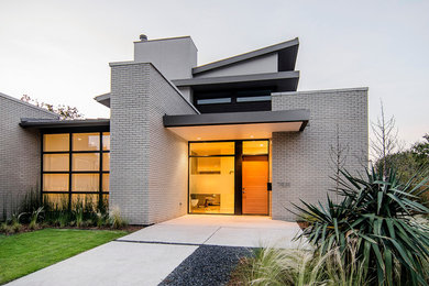 Example of a minimalist exterior home design in Dallas