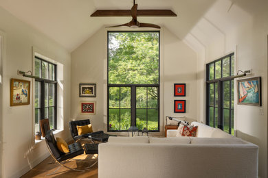Sunroom - mid-sized contemporary light wood floor and brown floor sunroom idea in Philadelphia