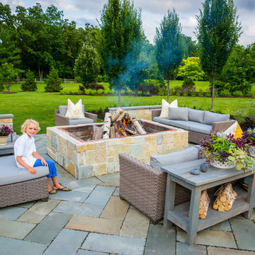Entertain in this Backyard Landscape with Patio & Firepit: Perfect for Families!