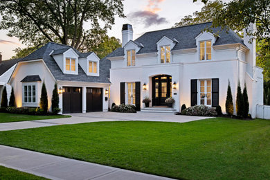 Example of a french country exterior home design in Kansas City