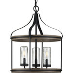Progress Lighting - Brenham Collection Black 3-Light Outdoor Pendant - The Brenham Collection Three-Light Black Pendant offers a true farmhouse feel with its mixed-elements design. Hand-painted weathered gray faux wood accent rings bookend the top and bottom of the light fixture. A black metal frame with simple metal bars and ribbon-like metal arms reach down from a central metal link chain. The frame holds clear seeded glass shades in place that add extra visual character.