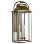 Visual Comfort Studio Collection - Wellsworth Medium Lantern, Painted Distressed Brass - The Feiss Wellsworth three light outdoor wall fixture in painted distressed brass creates a warm and inviting welcome presentation for your home's exterior. A subtle interplay of traditional design elements and nautical influences creates the charming visual approach to the Wellsworth outdoor collection by Feiss. Available in three finishes and two different aesthetics. Antique Bronze finish paired with Clear Seeded glass creates a more traditional look to these outdoor light fixtures; while Burnished Brass and Painted Brushed Steel finish coupled with Clear glass reflects a more contemporary approach. The Wellsworth collection includes a 3-light outdoor pendant, a 3-light outdoor post lantern, and 3-light small and medium outdoor lanterns, as well as a 4-light large outdoor lantern. Cast aluminum construction ensures durability. Wet Rated.