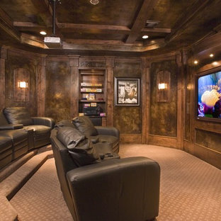 Home theater - traditional brown floor home theater idea in Houston with a projector screen