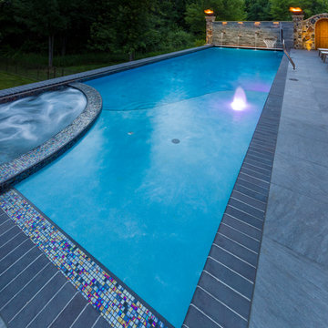 Orange Village pool, spa and arbor.