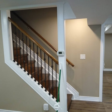 Basement Staircase with Wrought Iron Spindles