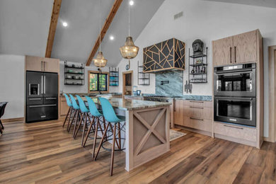 Inspiration for a mid-sized rustic l-shaped medium tone wood floor and vaulted ceiling eat-in kitchen remodel in New York with flat-panel cabinets, light wood cabinets and an island