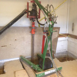 Foundation repair inside garage using portable anchor lift "HAL" - Products