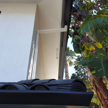 Huntington Beach California, White Fascia Wrap, Black 6 inch Angle Face Gutters